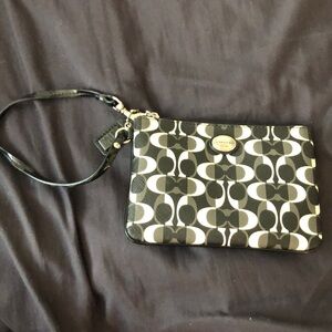 Coach wristlet black and white leather